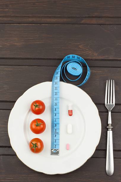 istock Diet and supplements on a wooden table 531546910