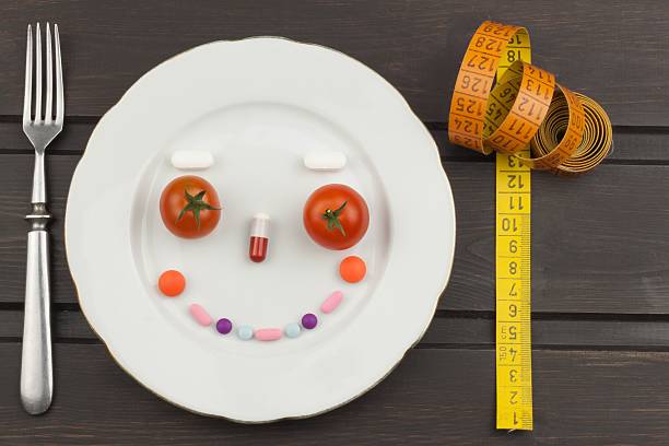 istock Diet and supplements on a wooden table 531546956