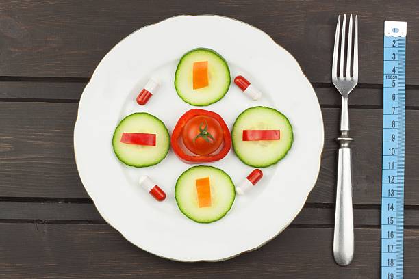 istock Diet and supplements on a wooden table 531547068