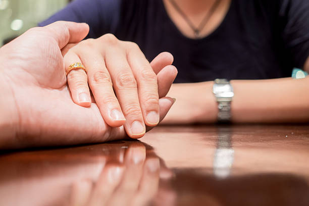 istock Mand holding woman hand with love 531548264