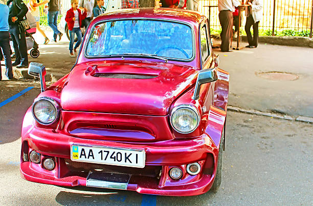 Retro car on the street in Vinnytsia Vinnytsia, Ukraine - May 14, 2016: Retro car on the street in Vinnytsia on the frame of Day of Europe in Vinnytsia, Ukraine. ZAZ Zaporozhets was a series of rear-wheel-drive superminis (city cars in their first generation) designed and built from 1958 at the ZAZ factory in Soviet Ukraine. Different models of the Zaporozhets, all of which had an air-cooled engine in the rear, were produced until 1994 vinnytsia stock pictures, royalty-free photos & images