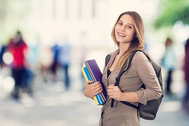 Student girl at school Student girl at school Is Going to College Still Worth It? stock pictures, royalty-free photos & images