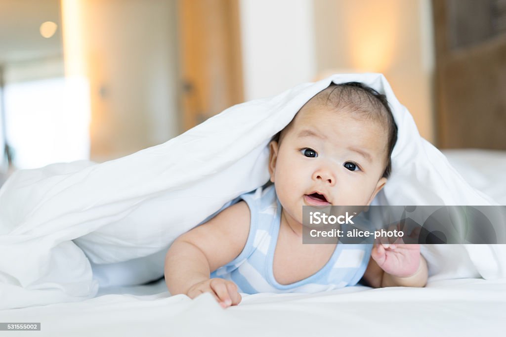 Portrait of a newborn Asian baby on the bed Portrait of a newborn Asian baby on the bedPortrait of a newborn Asian baby on the bed: SONY A7 Asia Stock Photo