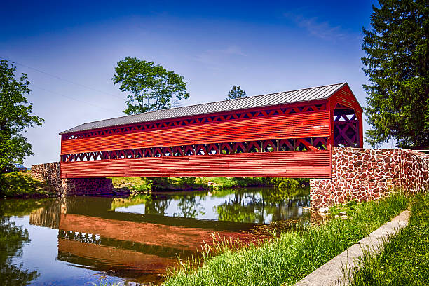 istock Sachs Covered Red Bridge at Marsh Creek in Pennsylvania 531556532