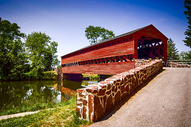 istock Sachs Covered Red Bridge at Marsh Creek in Pennsylvania 531556550