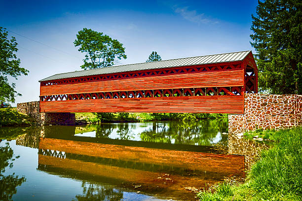 istock Sachs Covered Red Bridge at Marsh Creek in Pennsylvania 531556644