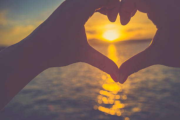 istock Woman making a heart shape with her hands. 531556998