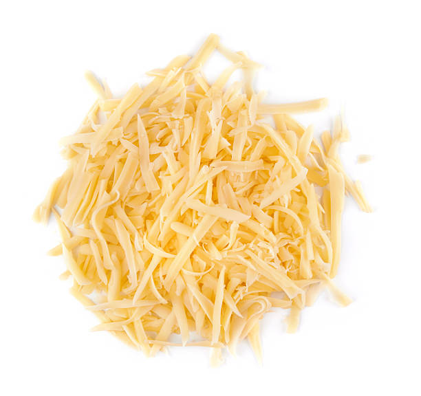 cheese Grated cheese isolated on a white background grated stock pictures, royalty-free photos & images