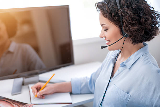 istock Cheerful woman working in the office 531558362