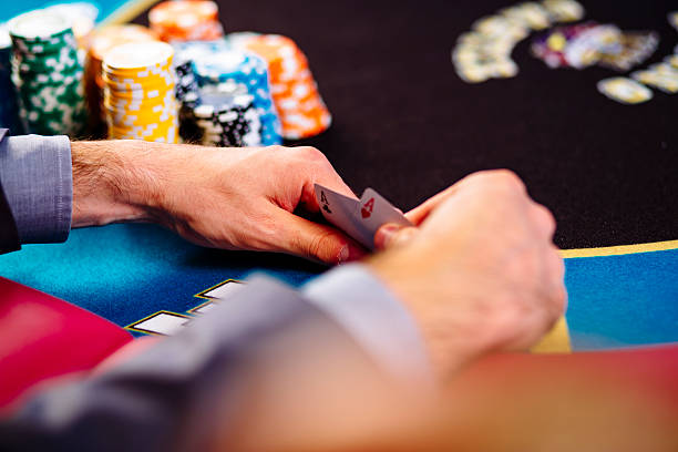 istock Hands with a pair of aces 531559524