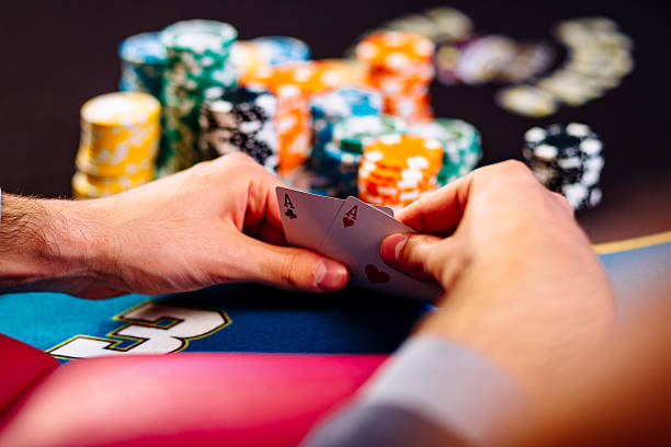 istock Hands with a pair of aces 531559756