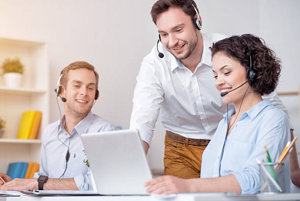 istock Positive colleagues working on the laptop 531560006