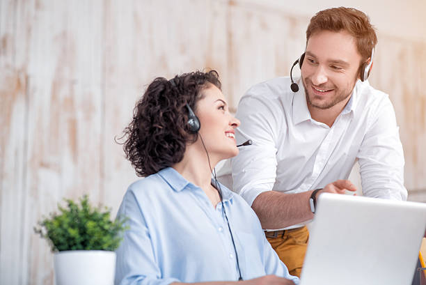 istock Positive colleagues working in the office 531560148