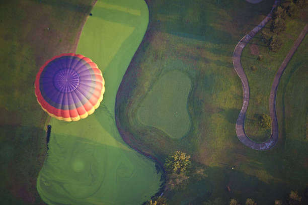 Balloon Over Golf Course stock photo