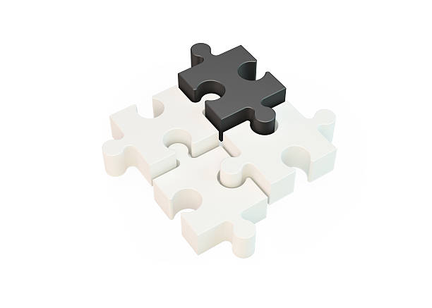 istock Black Jigsaw Puzzle Piece Standing Out From Others 531561446