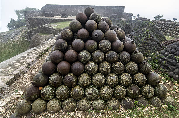 Canyon Bullets in Haitian Fortress Citadelle Laferriere in the fog, Northern Haiti citadel haiti photos stock pictures, royalty-free photos & images