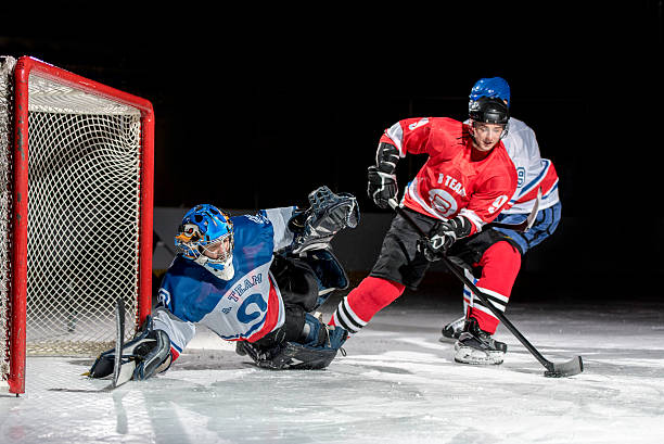 istock Ice hockey  players in action 531564976