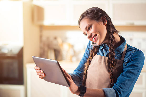 istock Positive woman talking on cell phone 531565628