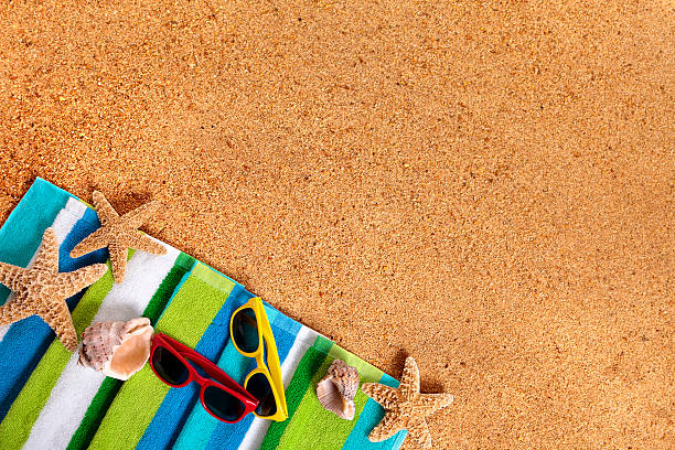 istock Tropical summer beach background, sunglasses, couple sunbathing 531566340