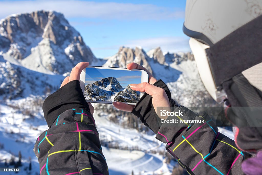 Photographing winter landscape with smart phone Photographing winter landscape mountains and snow, with cell phone Snow Stock Photo