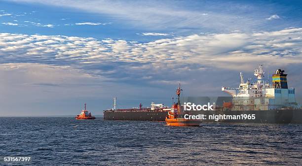 Ship With Tugs Stock Photo - Download Image Now - 2015, Blue, Business