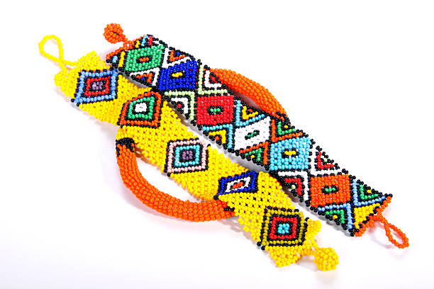 istock Two Beaded Zulu Wristbands Atop a Circular Armband 531568421