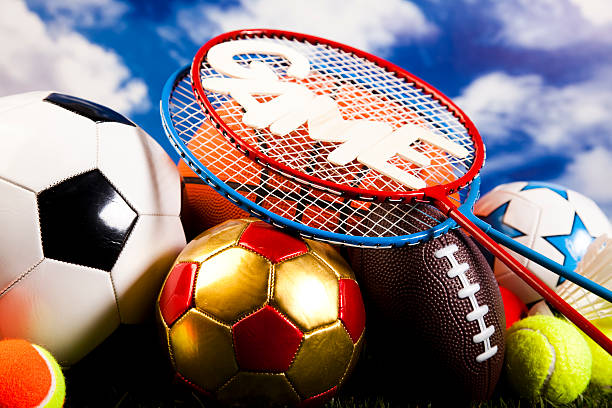 istock Assorted sports equipment and grass 531572013