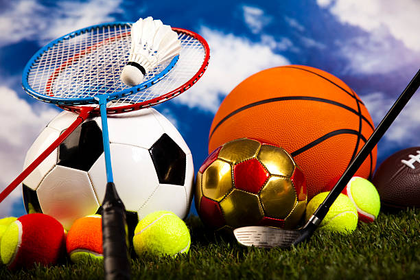 istock Assorted sports equipment and grass 531572025