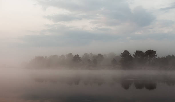 istock Clouds reflecting in the lake, Ukraine. 531579175