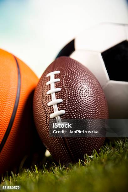 Assorted Sports Equipment Stock Photo - Download Image Now - 2015, Activity, American Football - Ball