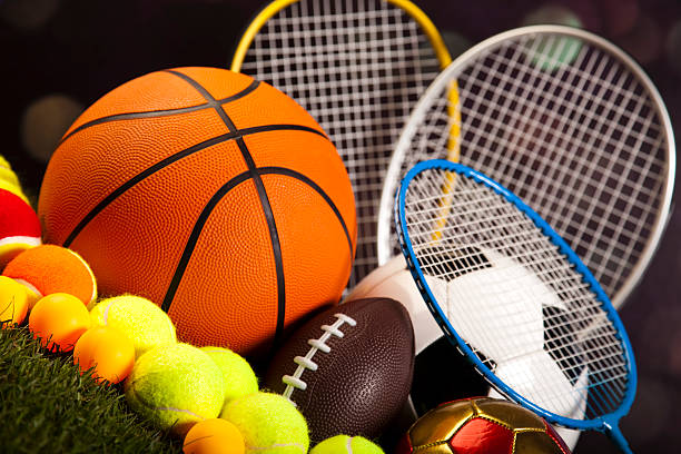 istock Assorted sports equipment and grass 531581053