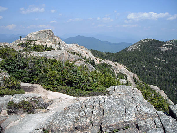 View from the summit of Chocorua A view of the White Mountains from the summit of Mt Chocorua in the National Forest, near Tamworth, New Hampshire. white mountains new hampshire stock pictures, royalty-free photos & images