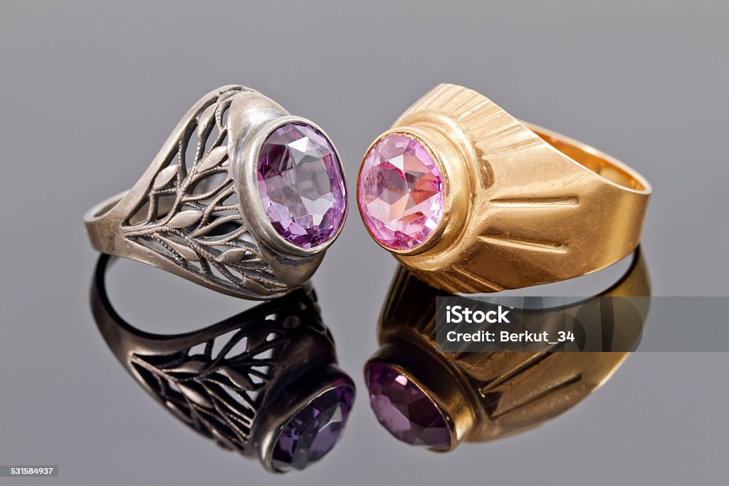 Two old ring from gold and silver with precious stones 2015 Stock Photo