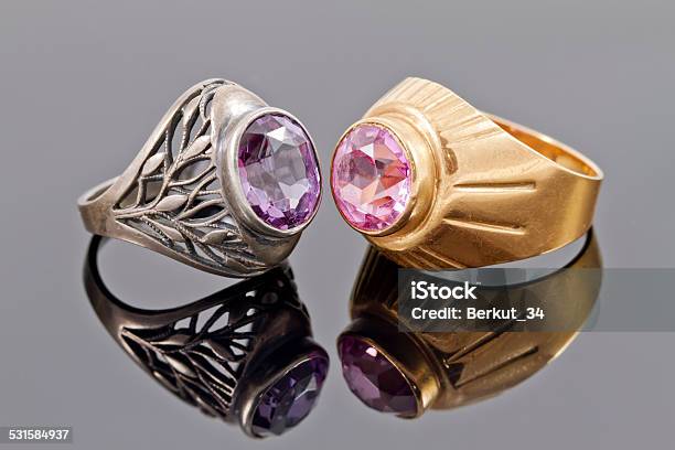 Two Old Ring From Gold And Silver With Precious Stones Stock Photo - Download Image Now