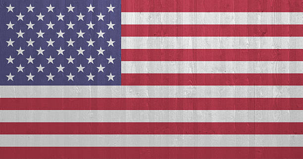 istock US flag on wooden plank wall 531594291