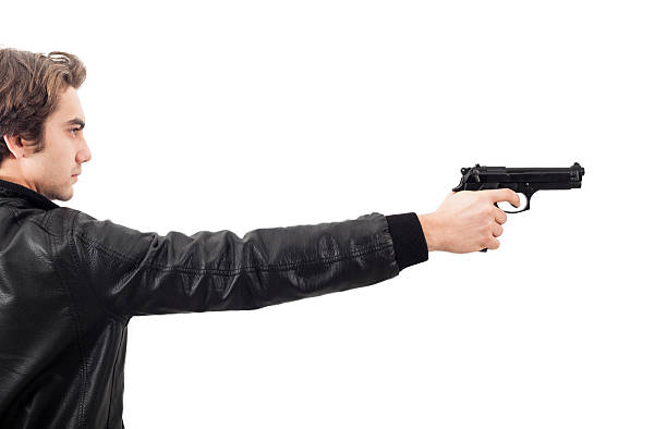 istock The man holding a gun 531599203