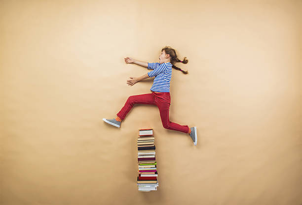 istock Girl with books 531599865