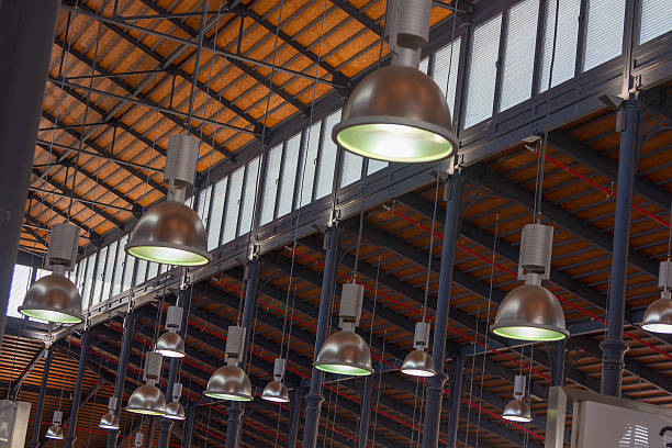 istock modern lights hanging from an old wooden roof 531600591