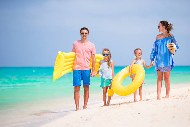 istock Young family on beach vacation 531603418