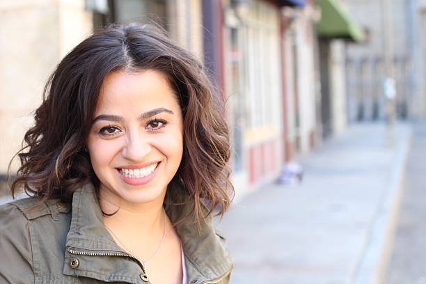 istock Hispanic female smiling with copy space 531603892