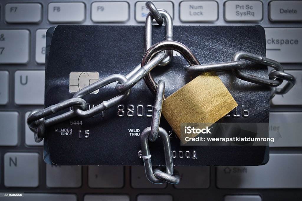 Credit card data encryption security chained credit cards - credit card data encryption protection concept Credit Card Stock Photo