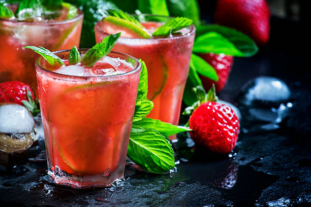 istock Alcoholic cocktail strawberry mojito with white rum 531607228
