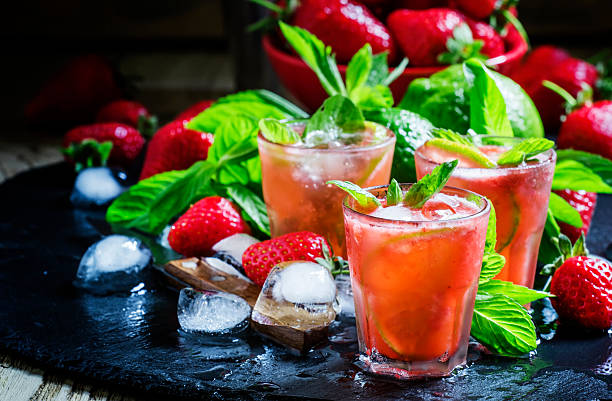 istock Alcoholic cocktail strawberry mojito with white rum 531607366