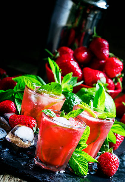 istock Alcoholic cocktail strawberry mojito with white rum 531607480