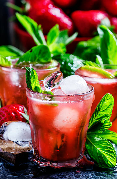 istock Alcoholic cocktail strawberry mojito with white rum 531607620