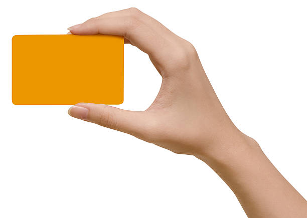 istock Hands hold business cards on white background with clipping path 531608120