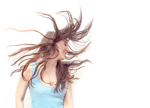 dancing young women with flying hair