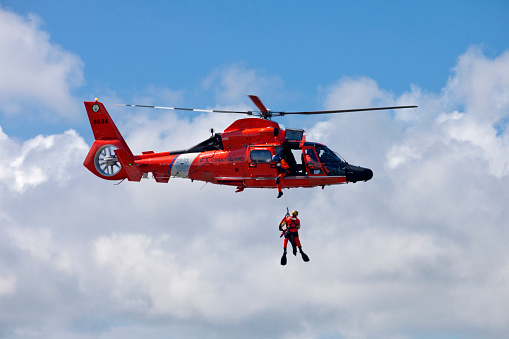 Rescue of the person at sea by helicopter.