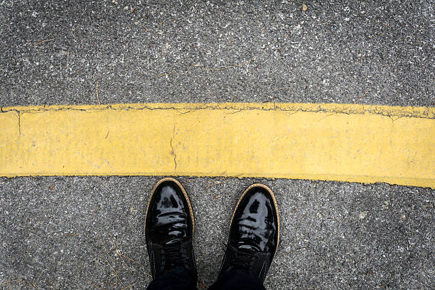 istock Standing On The Yellow Line 531609288