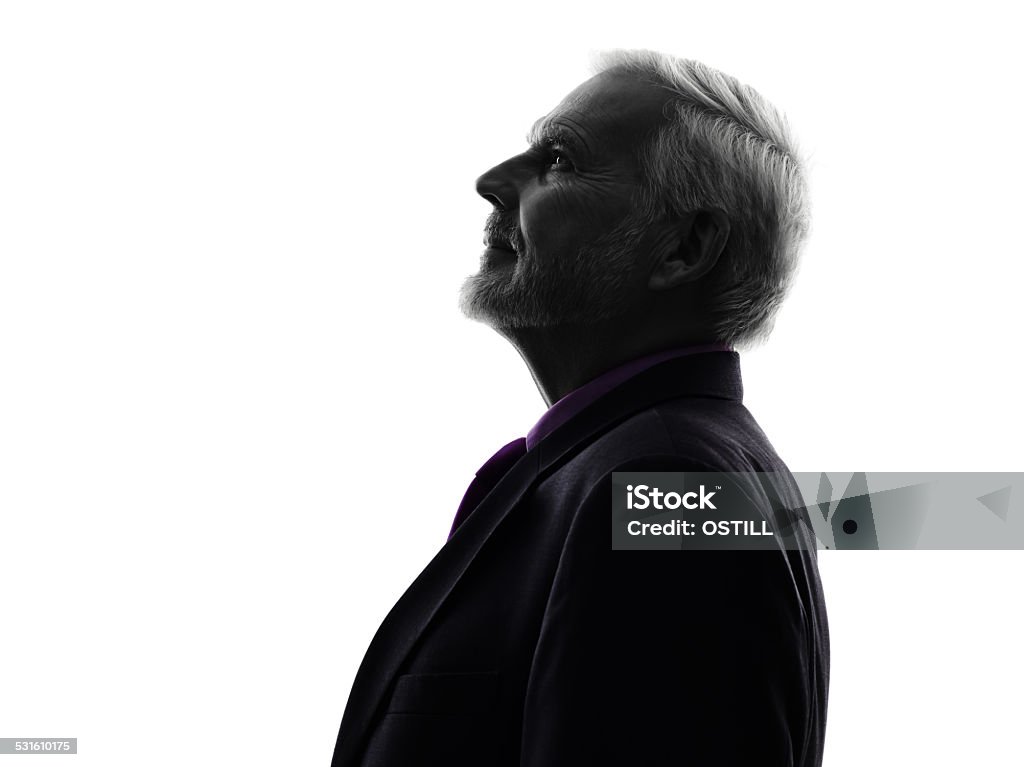 senior business man silhouette One Caucasian Senior Business Man Silhouette White Background In Silhouette Stock Photo
